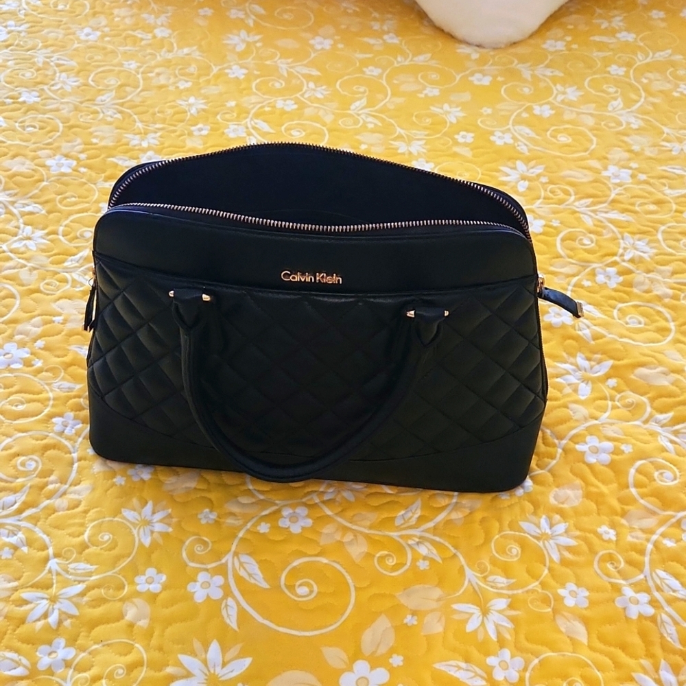 Calvin Klein  black quilted with gold handbag